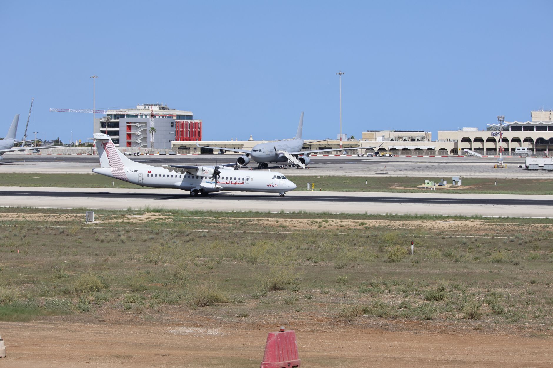 AJet aircraft taking off at an airport, showcasing its growing route network.