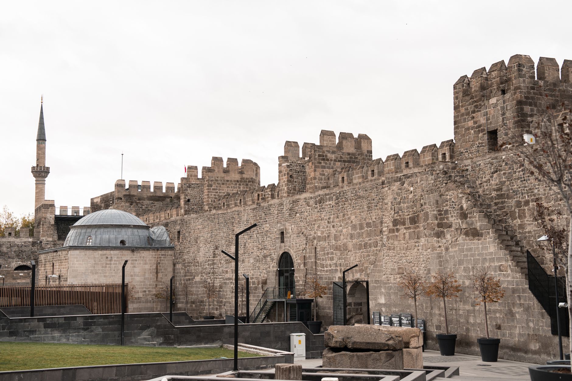 Historical site in Kayseri featuring fortress walls and a dome, ideal for patient exploration.