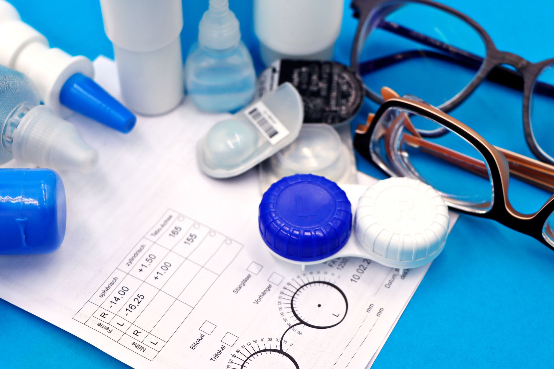 Essential optometry items including lenses, eye drops, and glasses for cataract surgery.