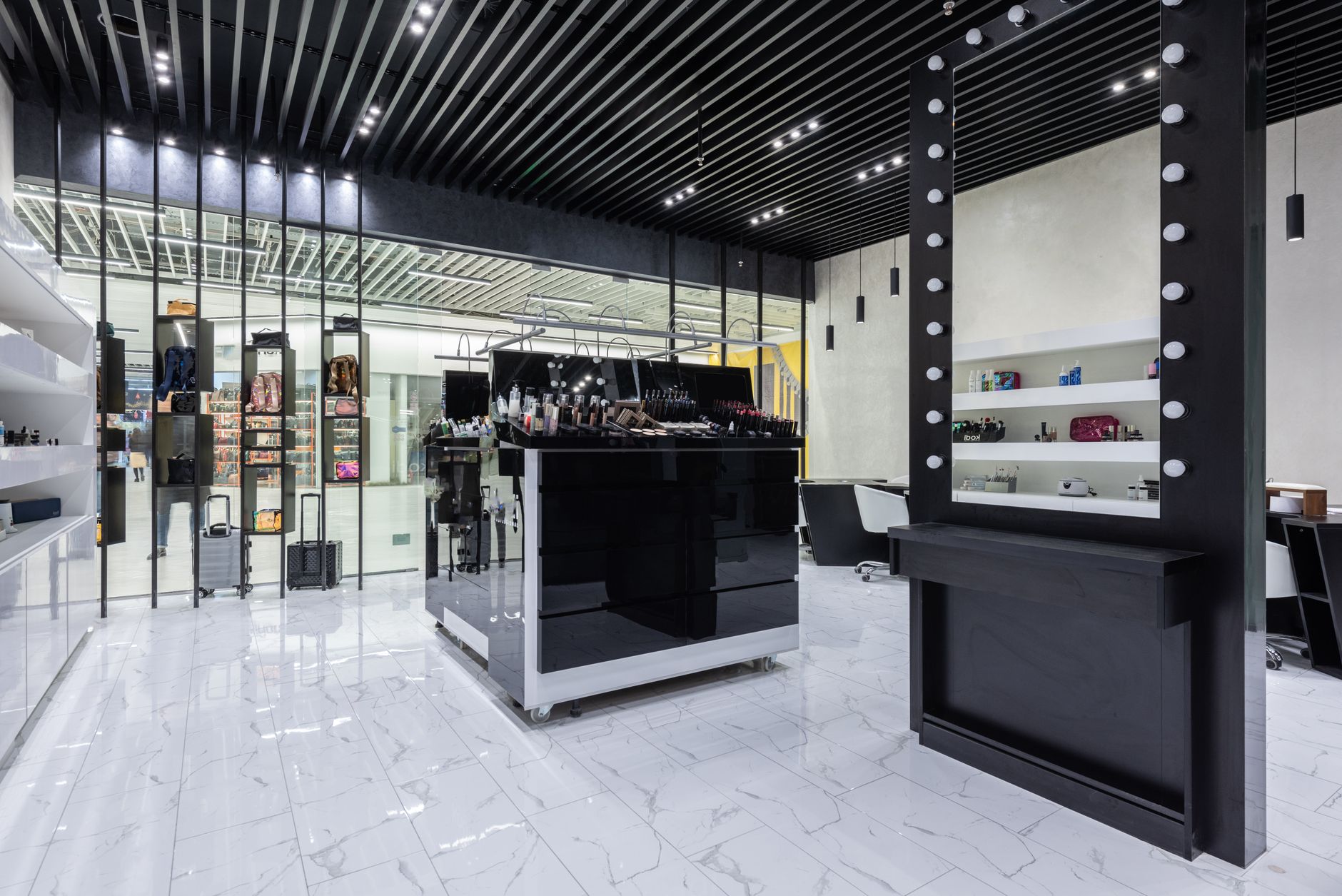 Luxurious boutique clinic interior featuring modern makeup stations and stylish decor.