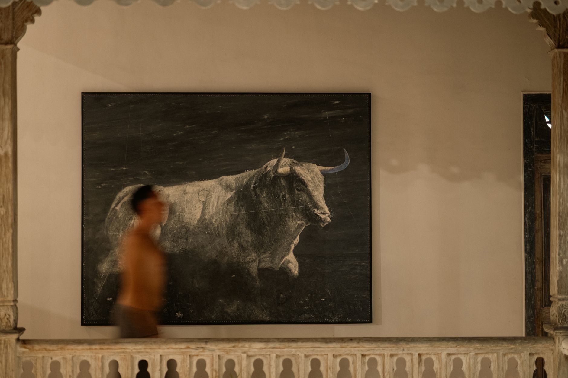 Interior of a Neolithic house at Çatalhöyük featuring a bull painting on the wall.