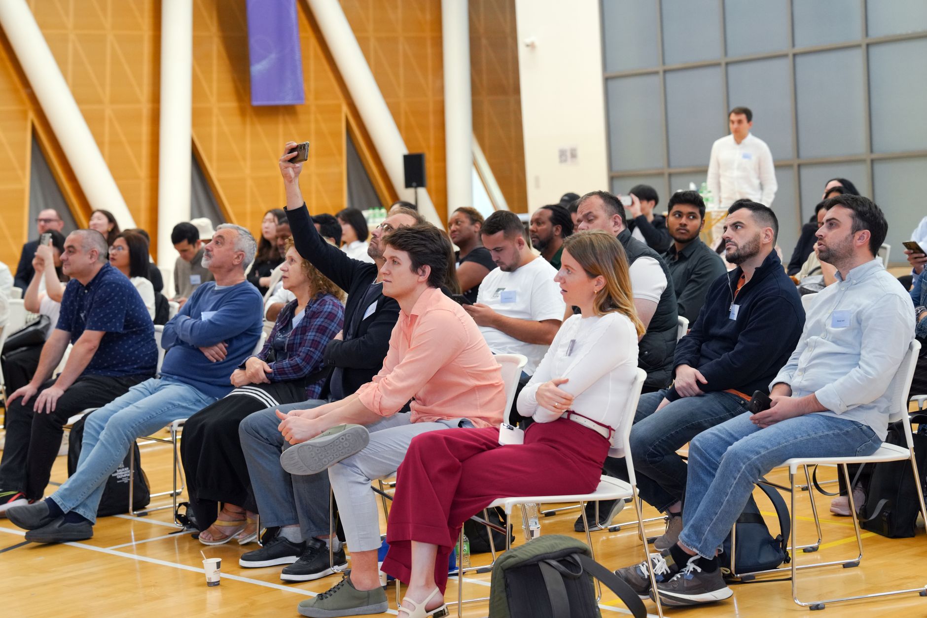 Attendees engaged at a medical congress session in Istanbul, listening attentively.