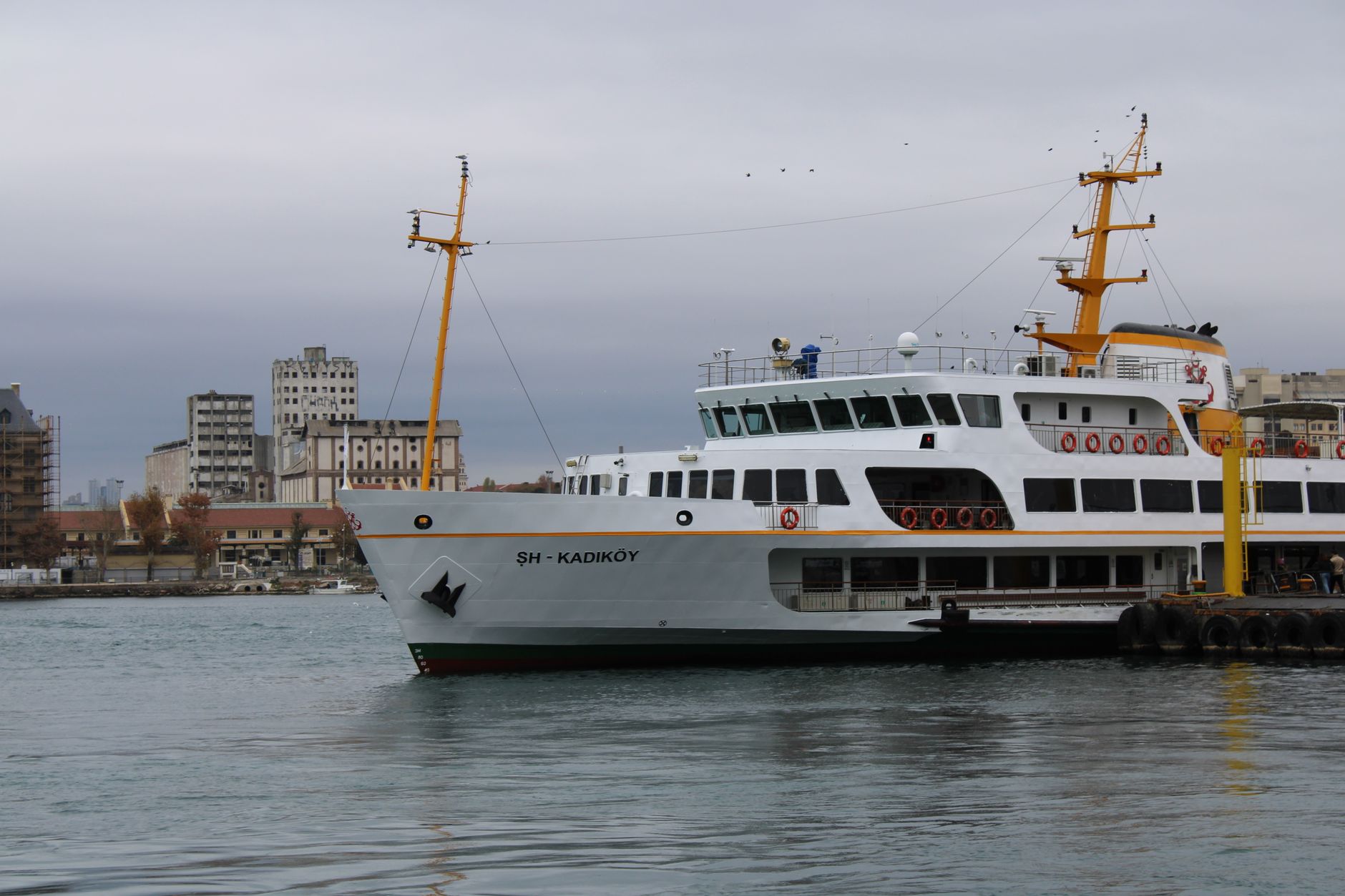 A Kadıköy ferry docked at the terminal in Istanbul, reflecting the city's transport for medical travelers.