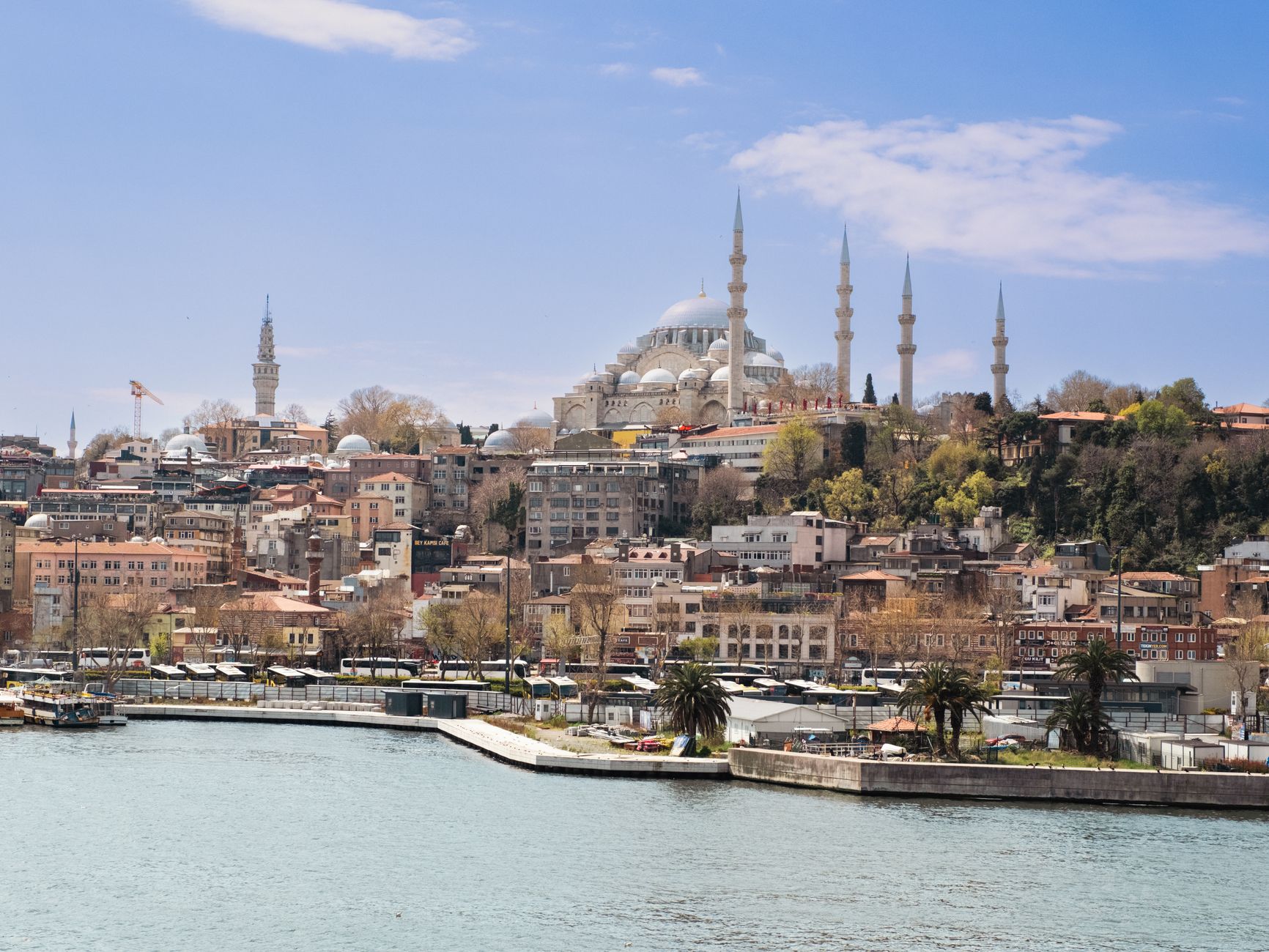 Panoramic view of Istanbul featuring a historic mosque and waterfront scenery.
