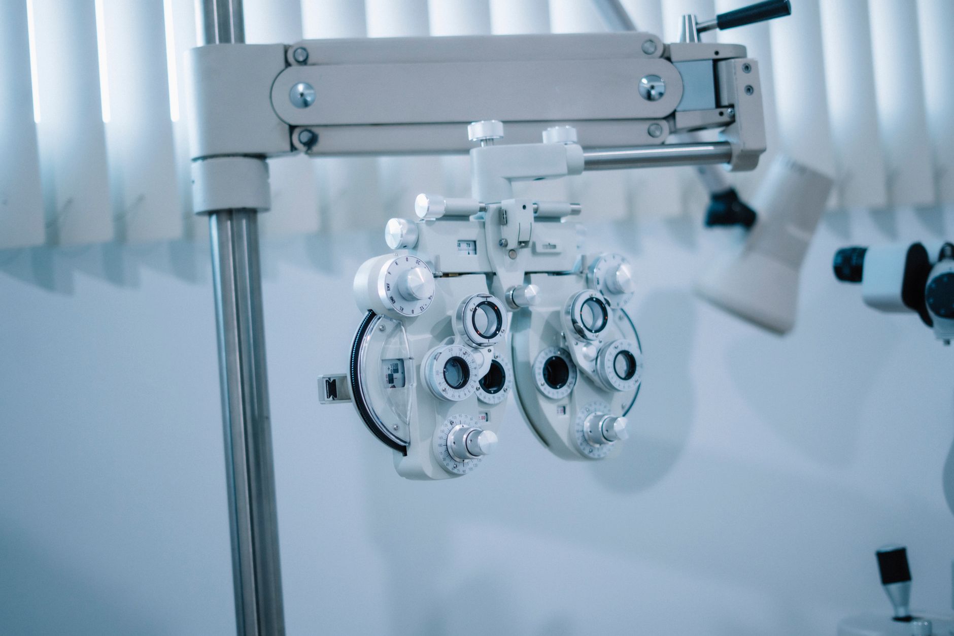 Close-up of a phoropter used in eye examinations at a modern clinic.