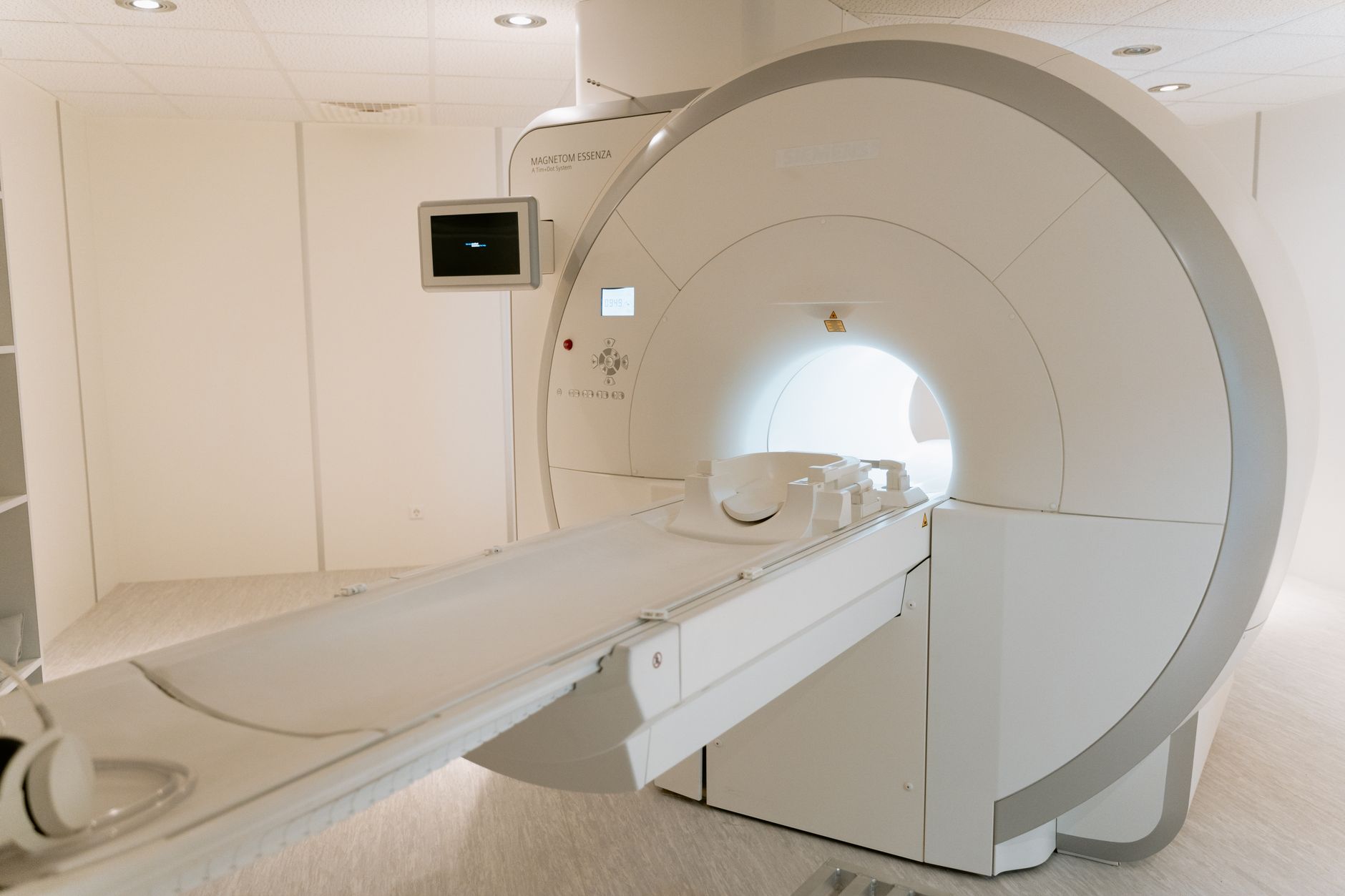 Modern MRI scanner in a clean hospital environment, used for medical imaging.