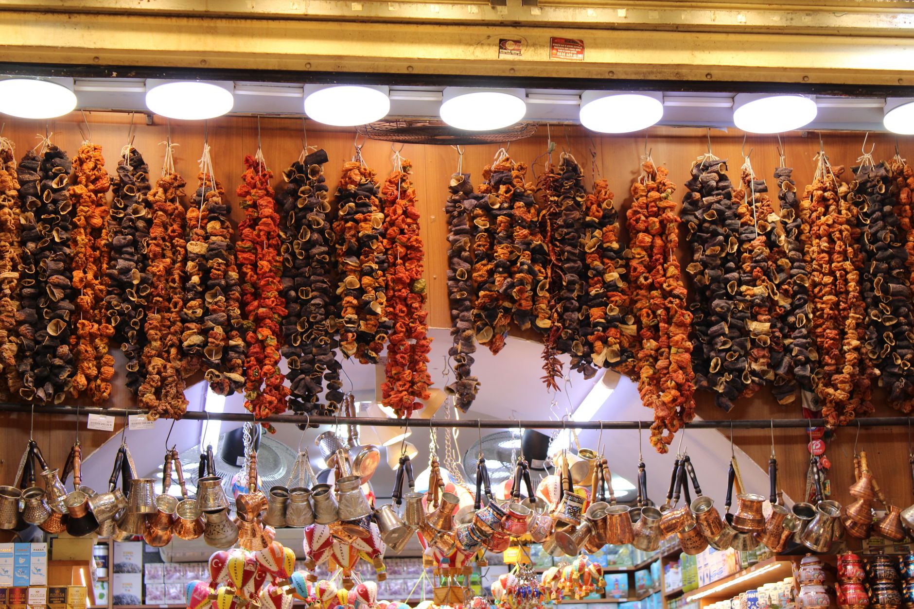 Colorful dried fruits hanging in the Istanbul Grand Bazaar, showcasing Turkish culinary culture.