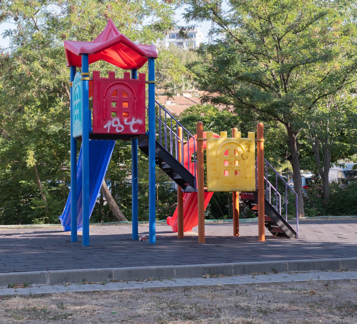 A vibrant playground with slides and climbing structures in an Istanbul park, perfect for family enjoyment.