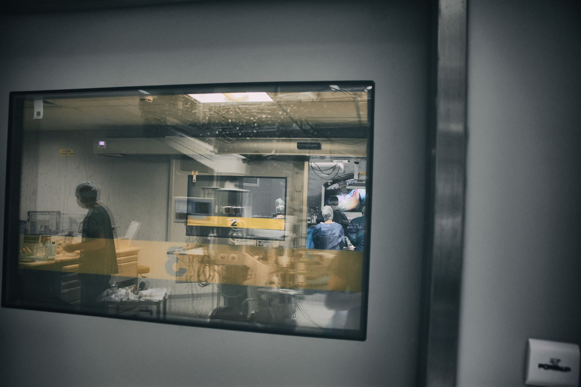 View through a window into a robotic surgery room in a Turkish hospital.