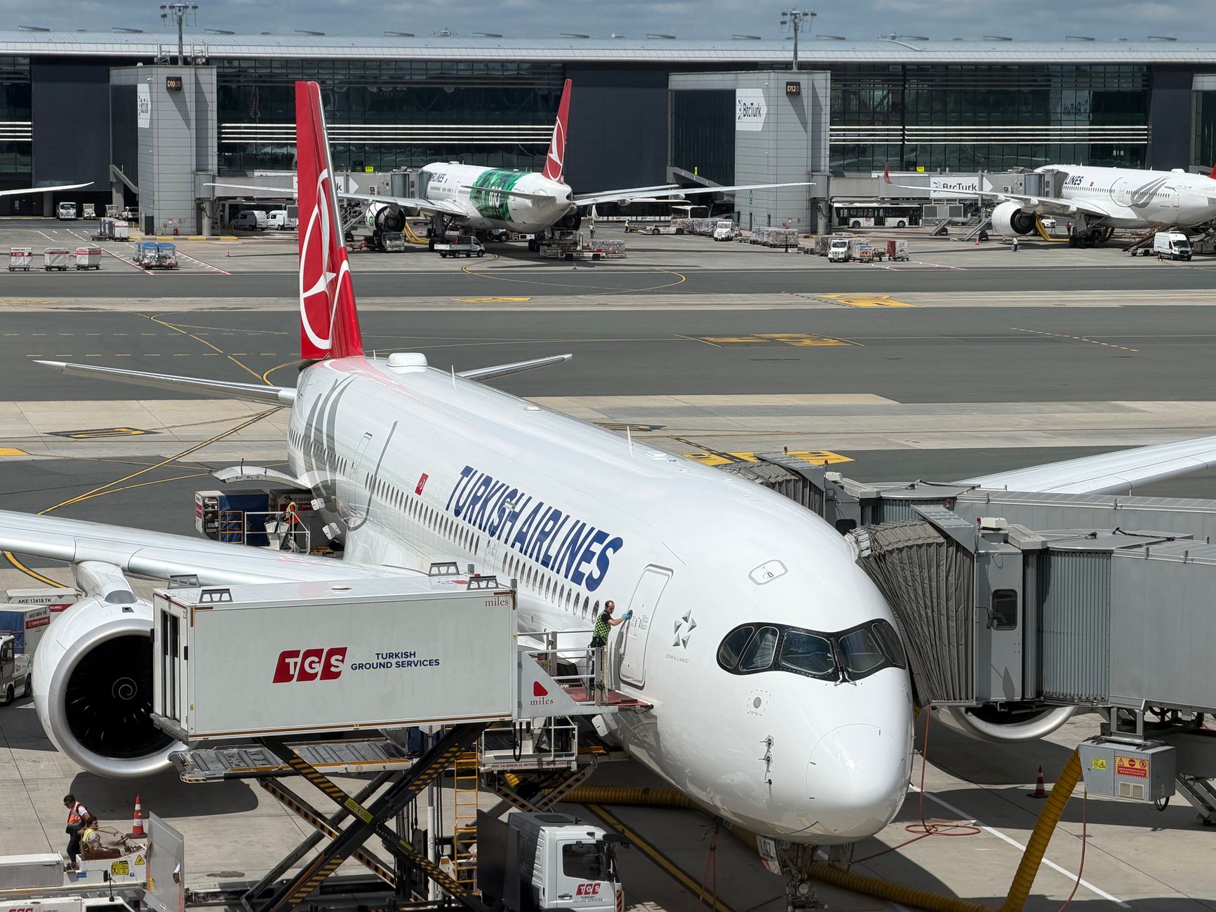 Turkish Airlines aircraft at the airport, showcasing efficient ground services and airport access.