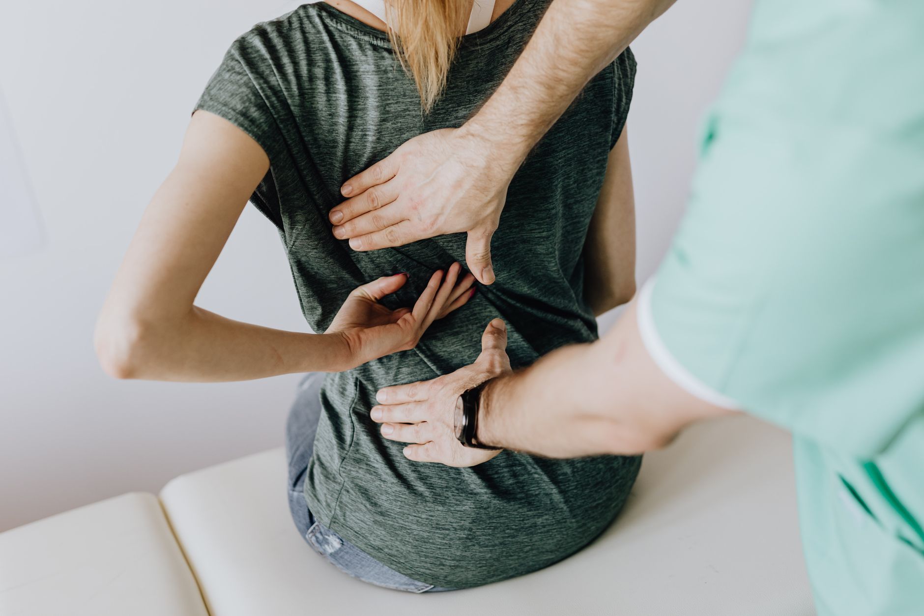 A rehabilitation session focused on spine recovery, showing hands-on care.