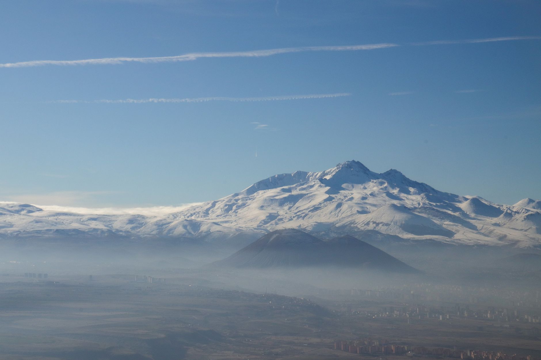 Panoramic view of Erciyes Mountain covered in snow, overlooking Kayseri city.