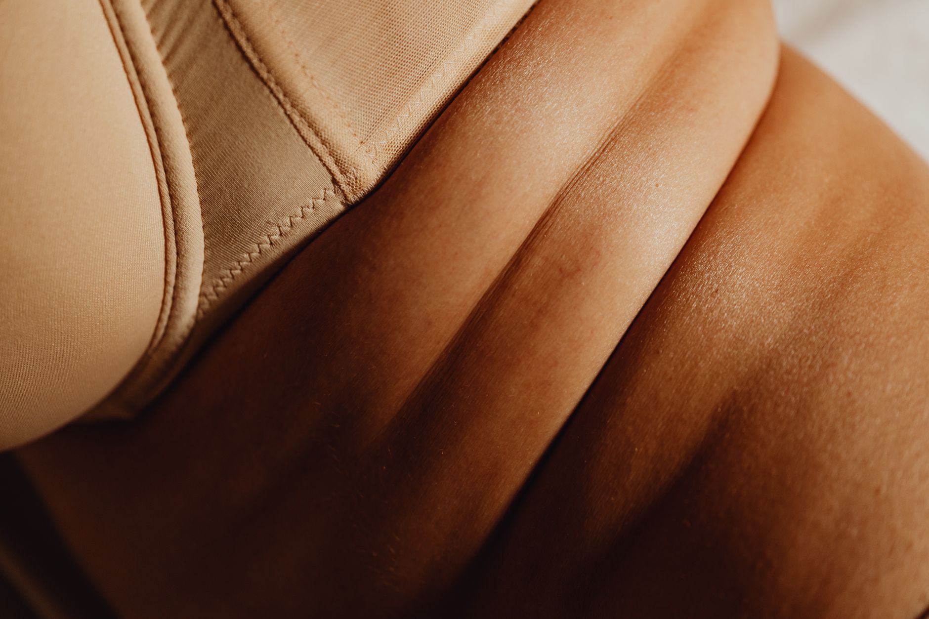 Close-up of skin showcasing transformation in body confidence.