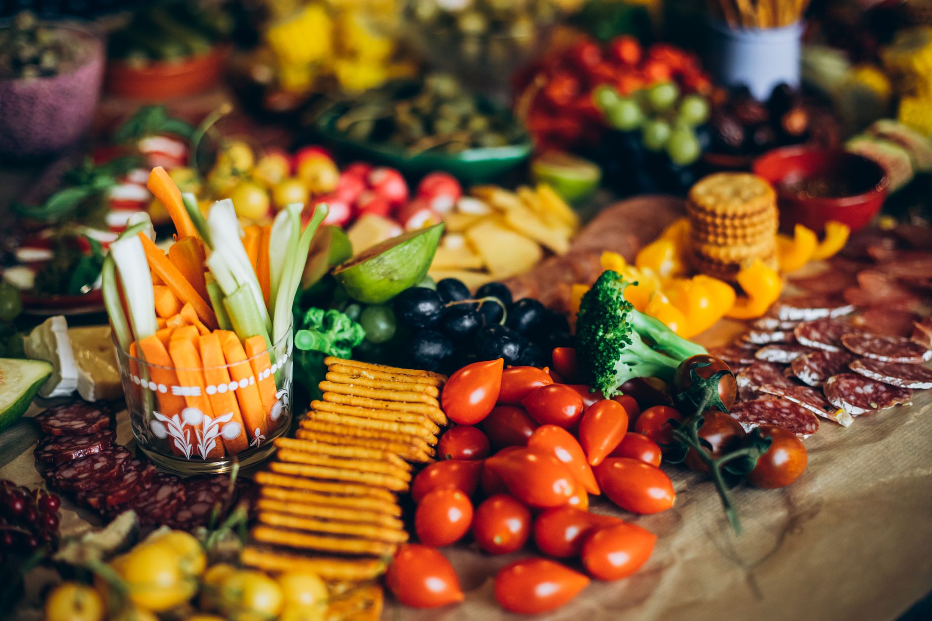 A vibrant spread of fresh vegetables, fruits, and snacks ideal for a kidney stone prevention diet.