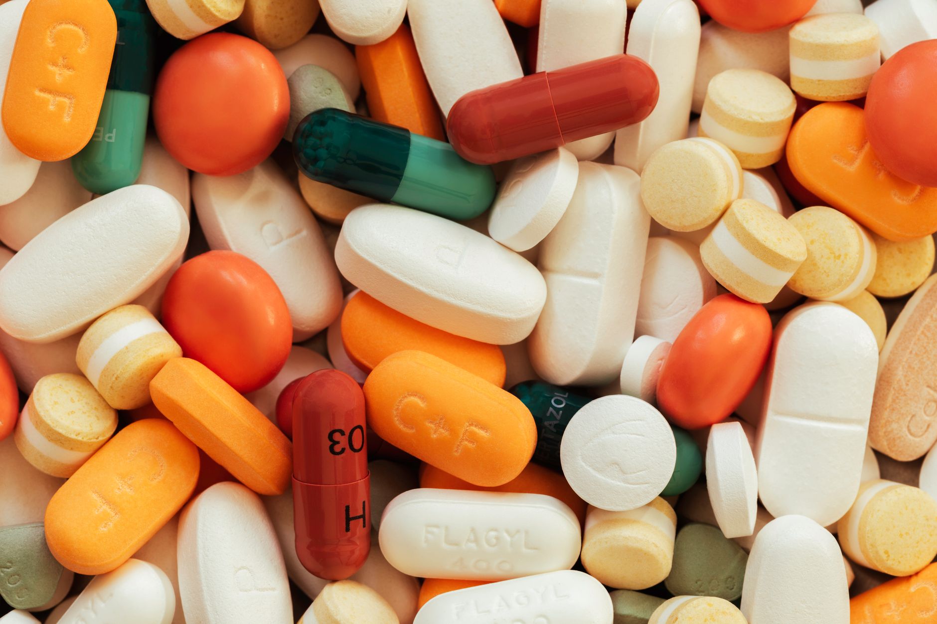 A colorful assortment of prescription medications displayed together.