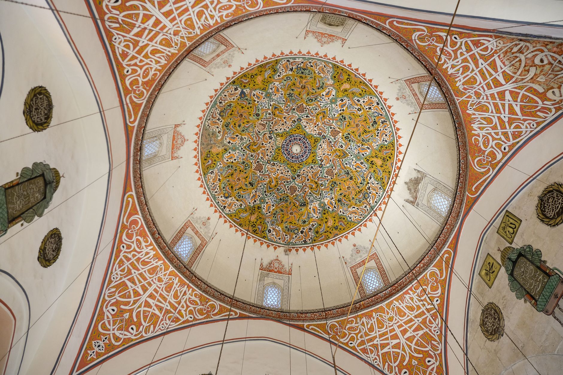 Ornate ceiling of a hospital in Konya, showcasing detailed floral and geometric patterns.