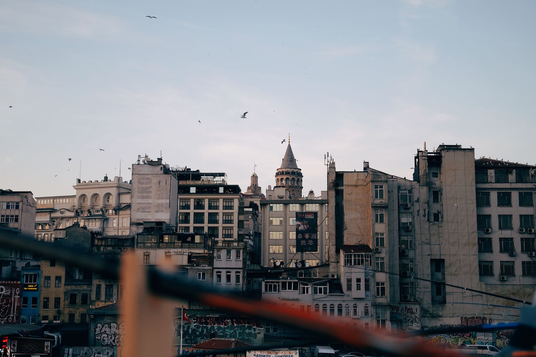 A beautiful view of Istanbul's skyline featuring historical buildings and vibrant street art.