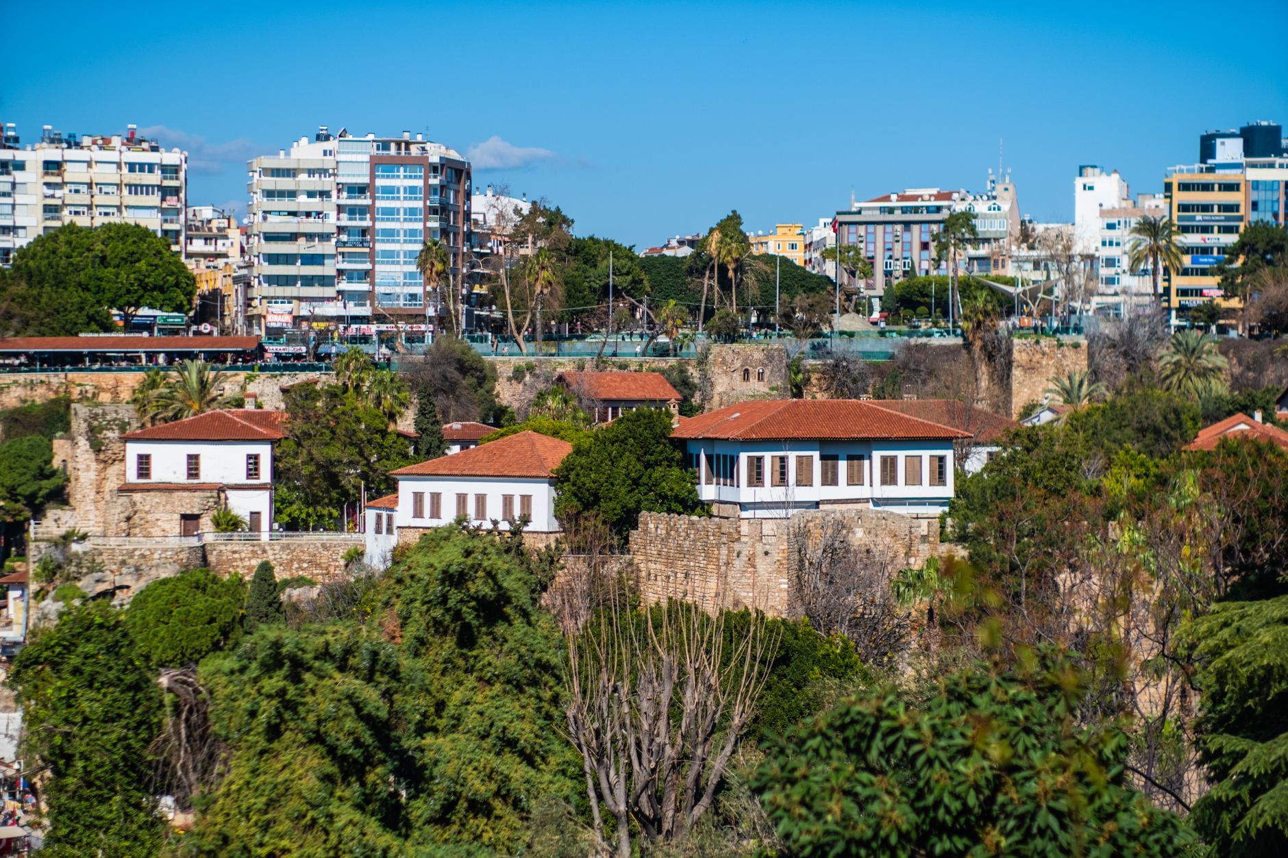 A mix of traditional and modern buildings in Antalya, Türkiye, showcasing its coastal beauty.