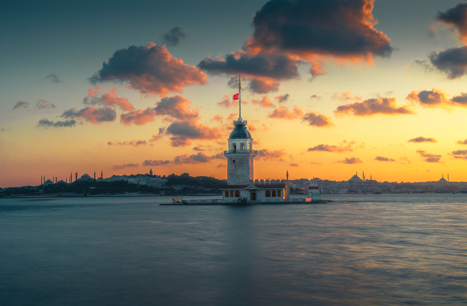 A scenic view of Maiden's Tower at sunset on the Bosphorus, Istanbul.