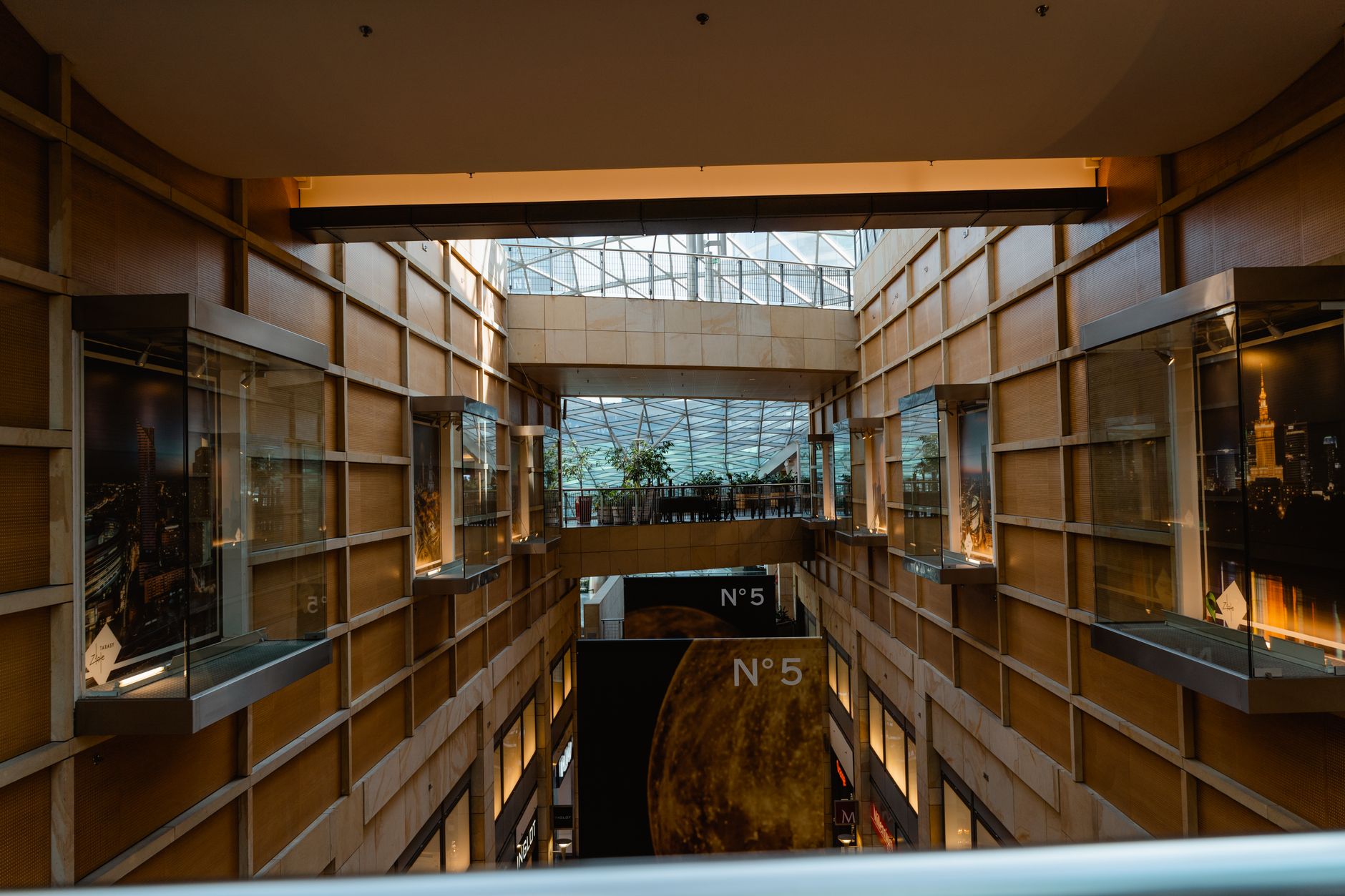 Interior view of a luxury shopping mall in Istanbul, showcasing elegant architecture and display cases.