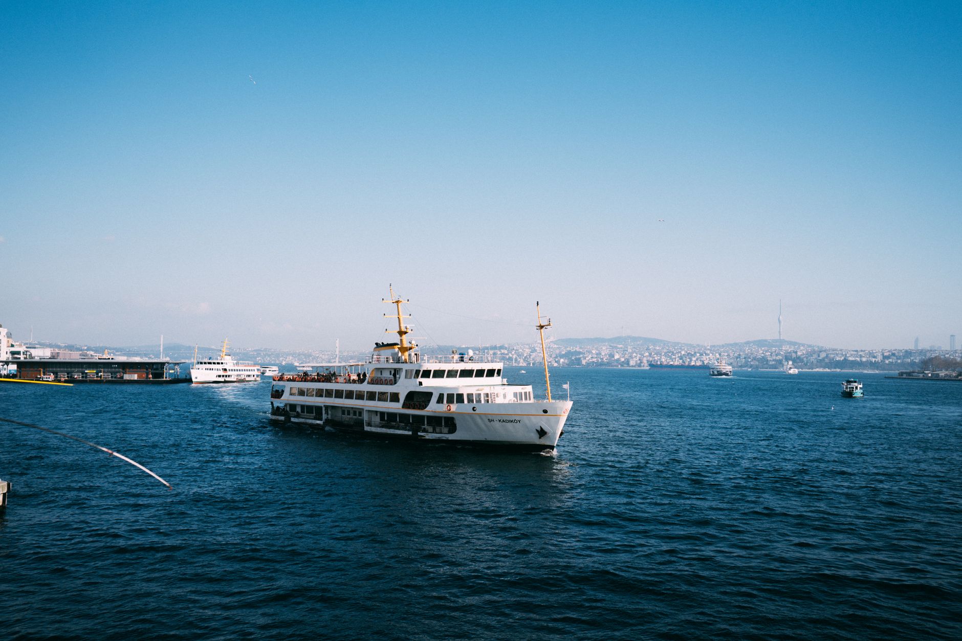 A ferry navigating the Bosphorus in Istanbul, showcasing the city's beauty and appeal for medical tourists.