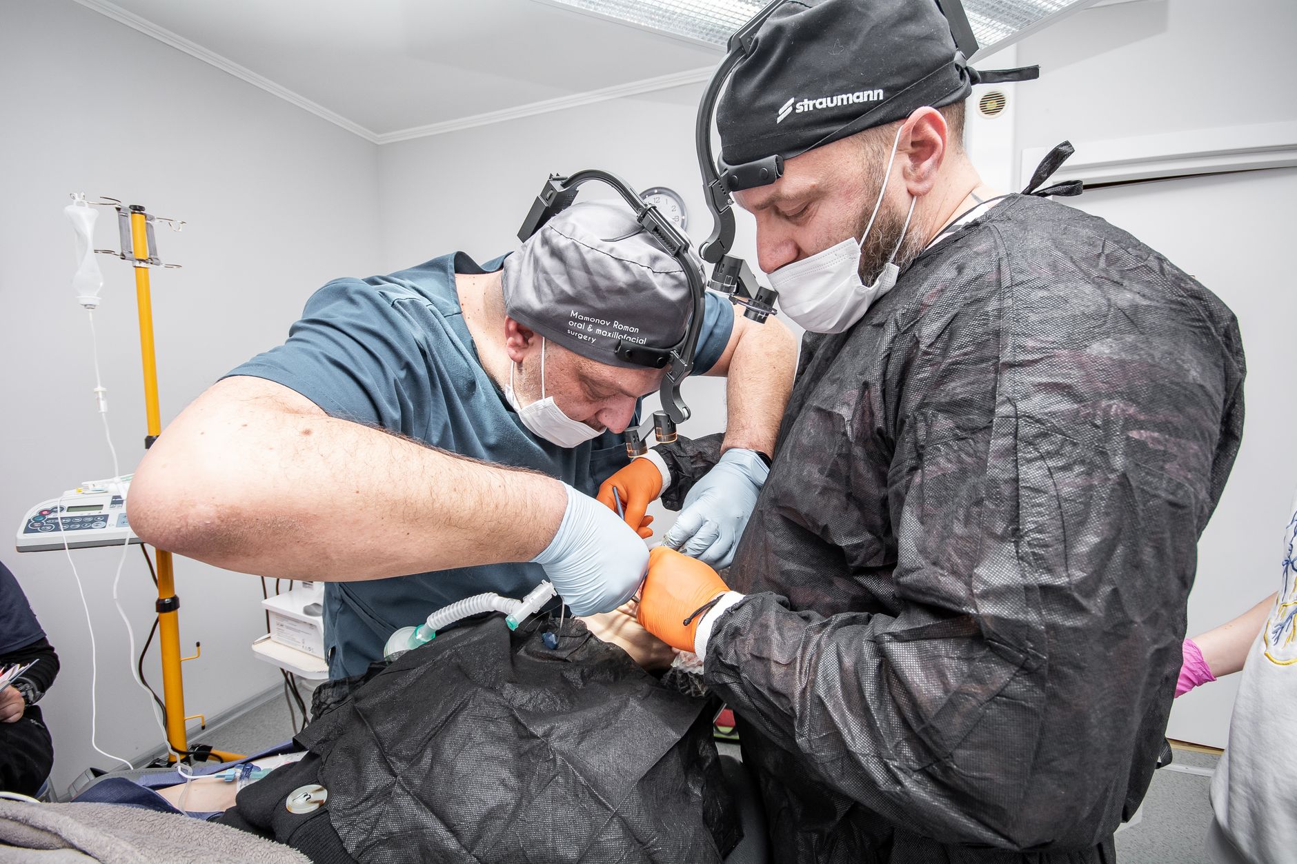Surgeons performing a hair restoration procedure in a Turkish clinic.