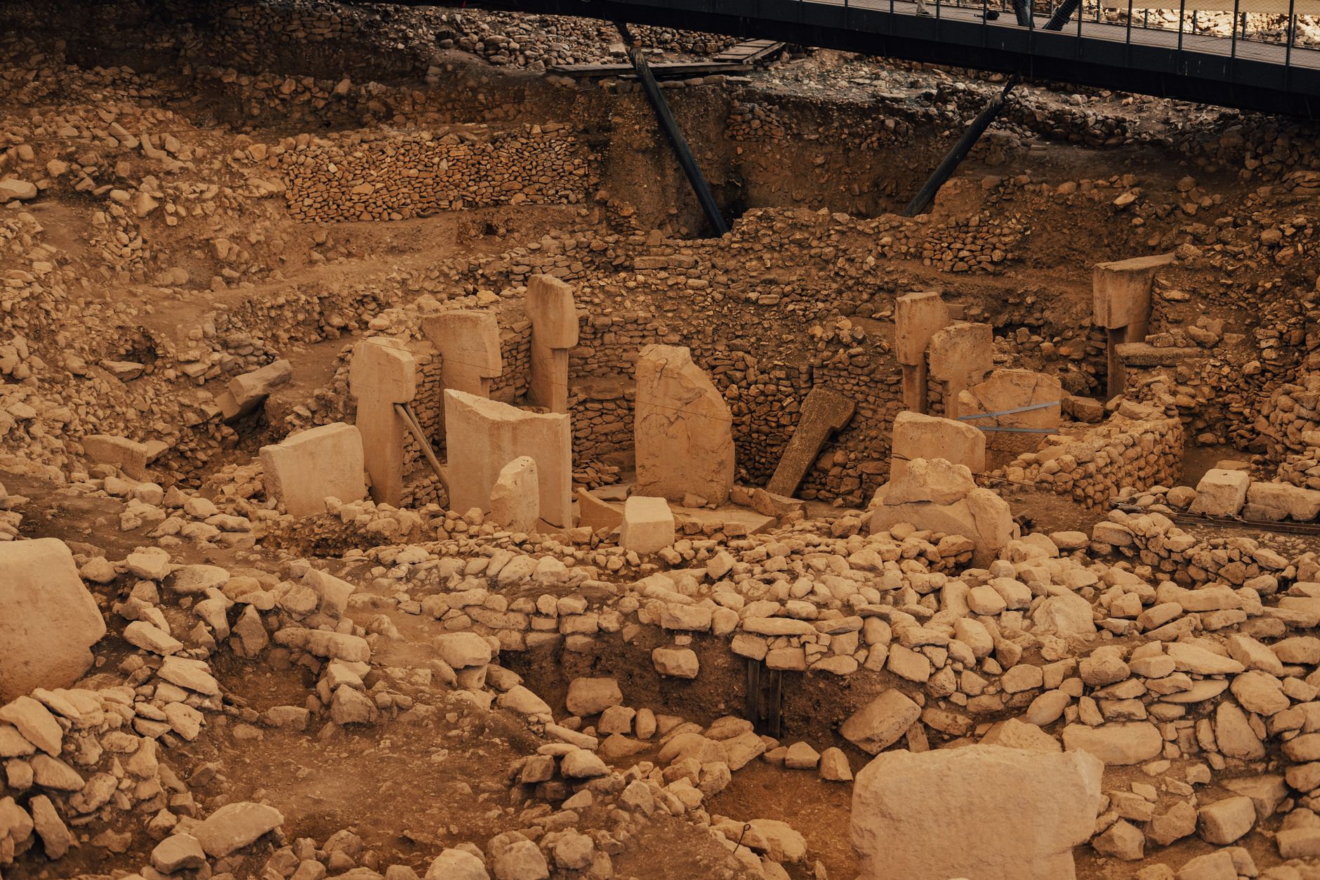 Excavated Neolithic structures and stones at Şanlıurfa Archaeology Museum.