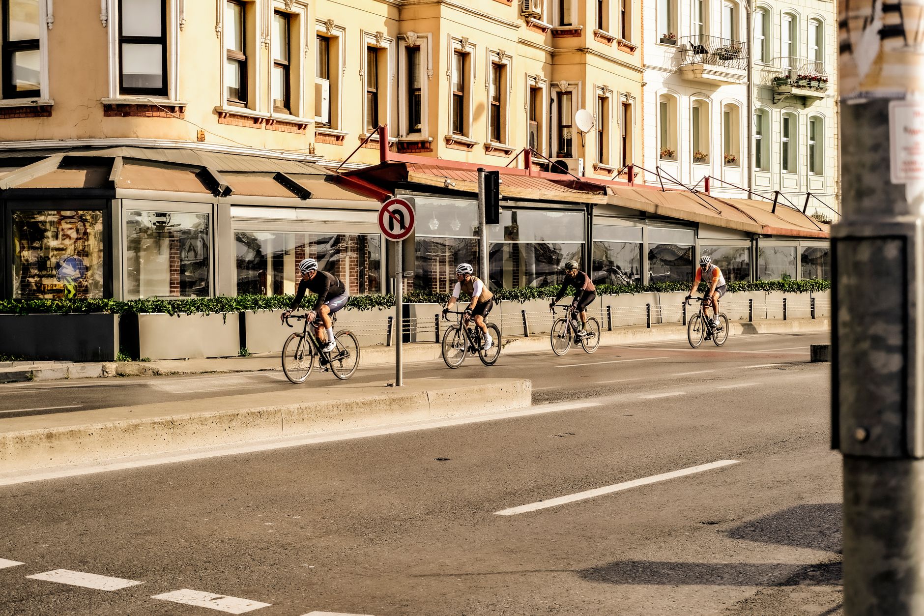 Four cyclists on a recovery ride along the coast of Antalya, Türkiye.