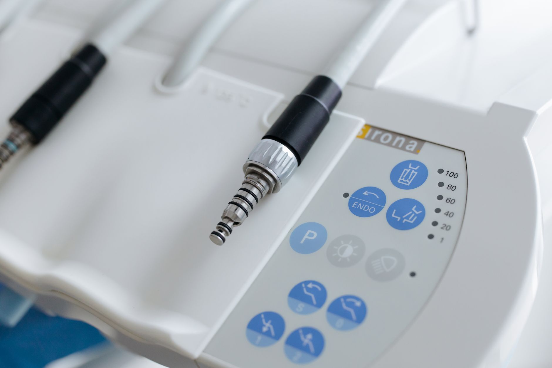 Close-up of advanced dental machine controls in Turkish medical facility.