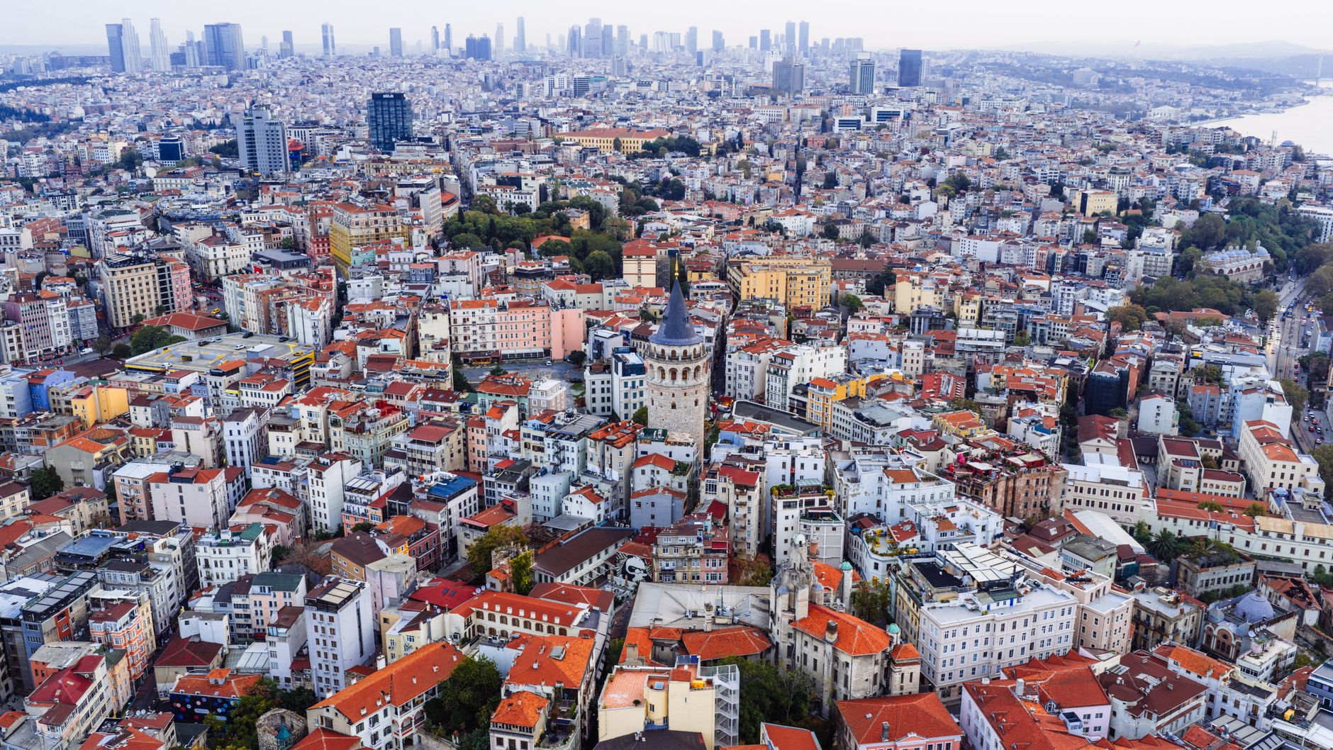 Aerial view of Istanbul showcasing the city's skyline and the Galata Tower amid urban landscape.