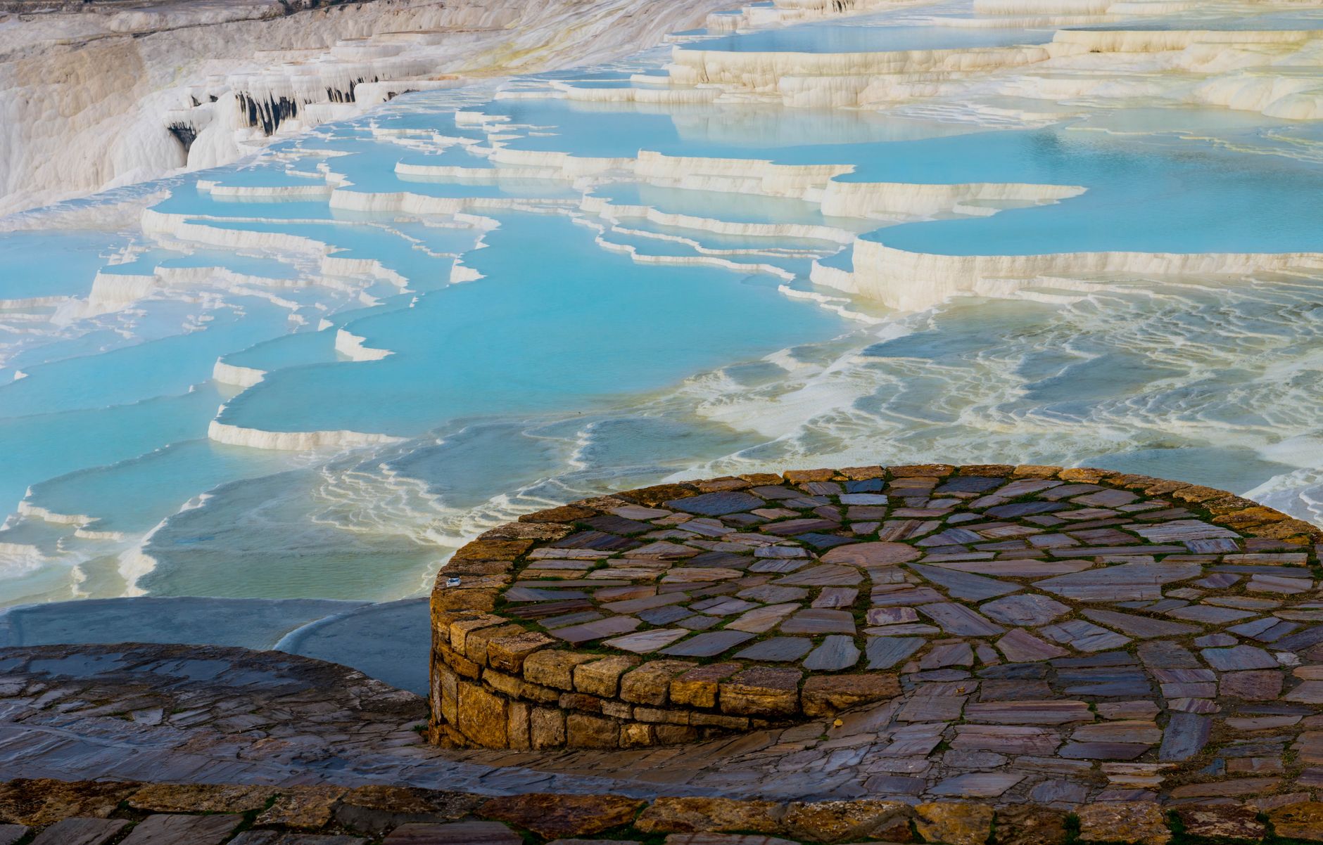 Close-up of Pamukkale's stunning mineral-rich thermal pools, showcasing their unique terraces.