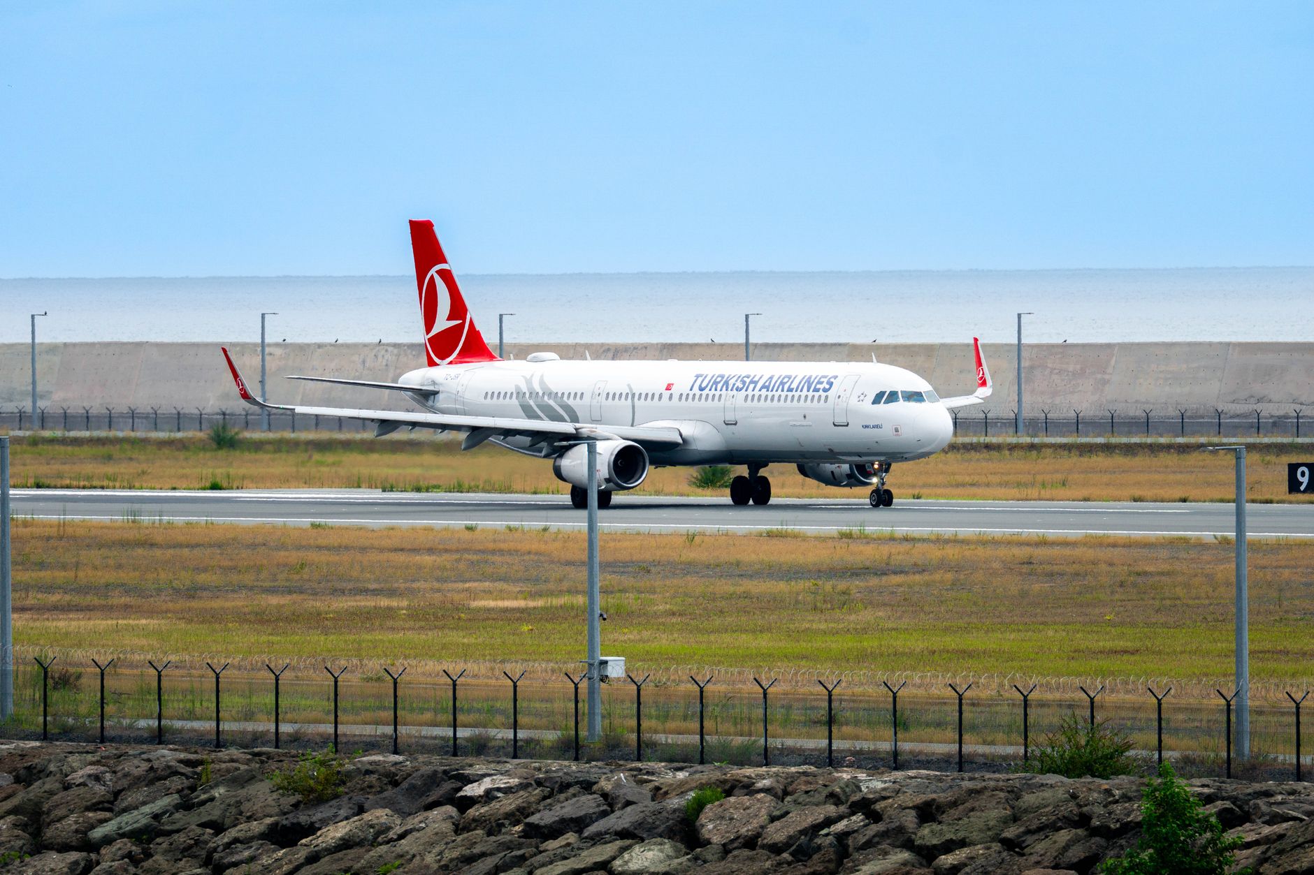 A Turkish Airlines aircraft taxiing on the runway, showcasing expanded flight networks.